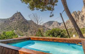Nice home in Malaga with Outdoor swimming pool, WiFi and 2 Bedrooms